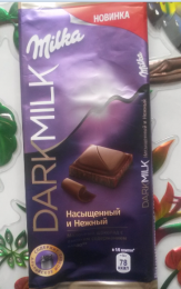 Молочный шоколад Milka Dark Milk насыщенный и нежный