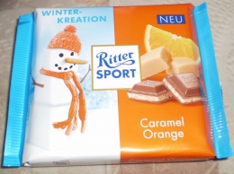 Шоколад Ritter Sport молочный с карамельно-апельсиновой начинкой