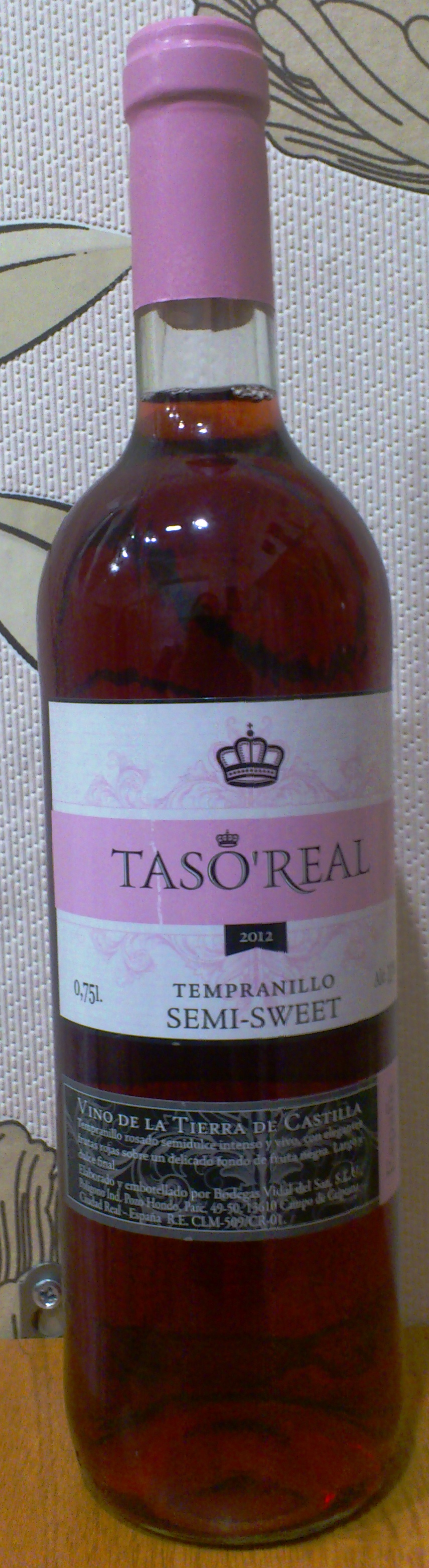 Розовые вина кб. Вино Тасо реаль Темпранийо розовое. Вино taso real розовое. Вино Тасо реаль Темпранийо розовое полусладкое 0.75л Испания. Taso real красное полусладкое.