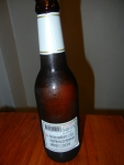 Бутылка пива Singha с обратной стороны