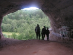 У выхода из пещеры