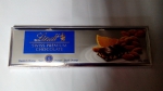 Швейцарский темный шоколад с апельсином и миндалем Lindt
