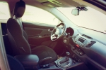 Автомобиль Kia Sportage  водительское сиденье и панель управления