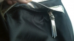 Скрытый карман в стороне сумки