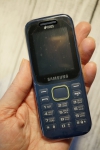 Мобильный телефон Samsung SM-B310E - весь телефончик оклеен пленкой