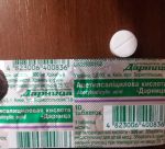 Таблетка препарата Аспирин