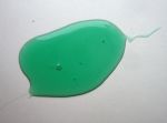 Зеленая капля жидкости для мытья посуды Sorti (ромашка)