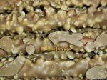 Ирисо-сливочная глазурь, обсыпанная дробленным орехом арахиса