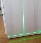 Линии лазера на стене