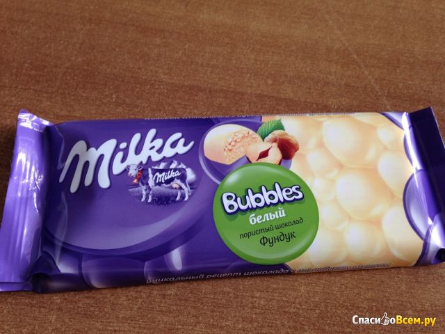 Белый пористый шоколад Milka bubbles с фундуком