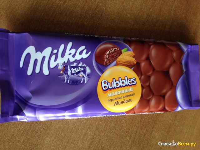 Молочный пористый шоколад "Milka Bubbles" Миндаль