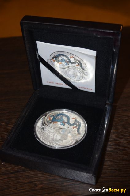 Серебряная монета 2$ "Драконы. Инь-янь" 2012 г.