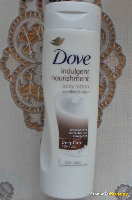 Лосьон для тела Dove "Обьятия нежности" с маслом ШИ