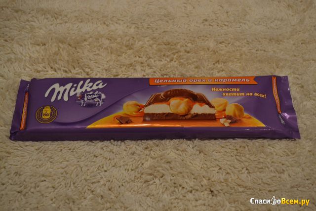 Шоколад Milka "Цельный орех и карамель"