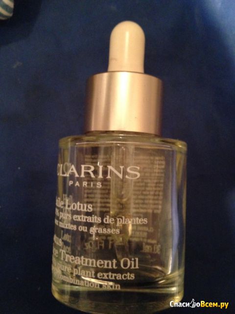 Масло для лица Clarins Huile Lotus Face Treatment Oil