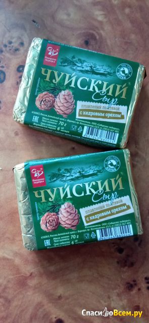Сыр плавленый ломтевой "Сибирское подворье" "Чуйский" с кедровым орехом 47%