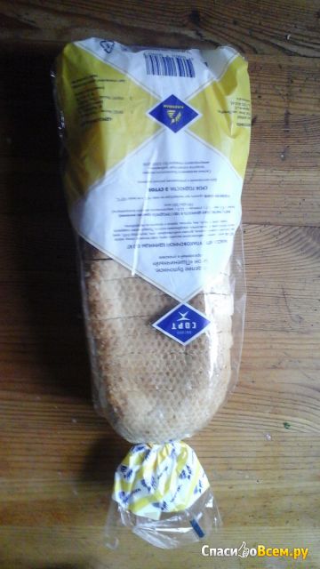 Батон "Пшеничный" Каравай, нарезанный в упаковке